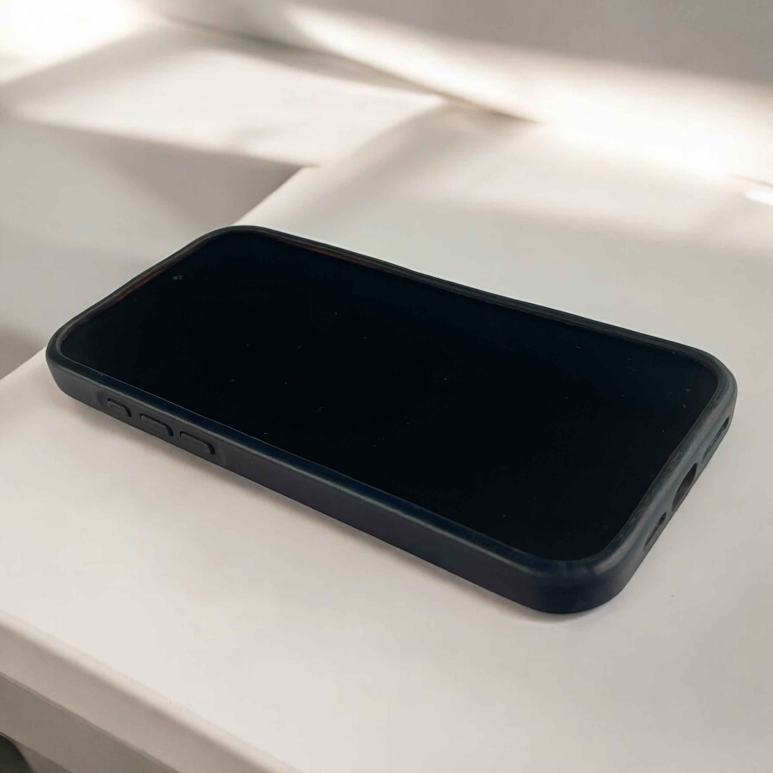 Handmade iPhone leather case with MagSafe, crafted from genuine leather.
