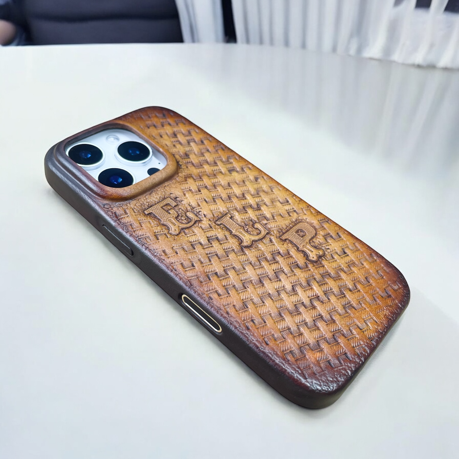 BridleBlack iPhone leather case carving.