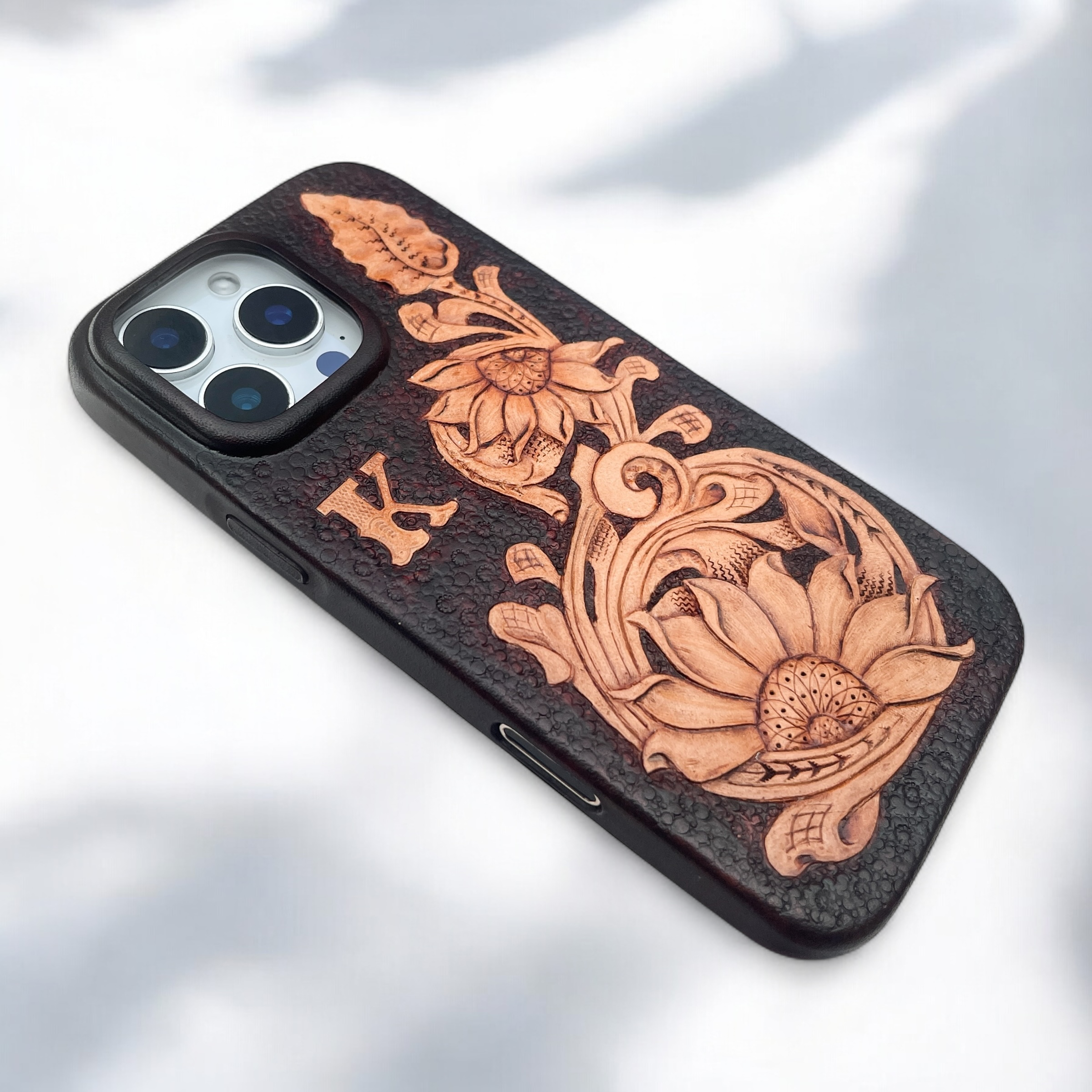 BridleBlack iPhone leather case carving.